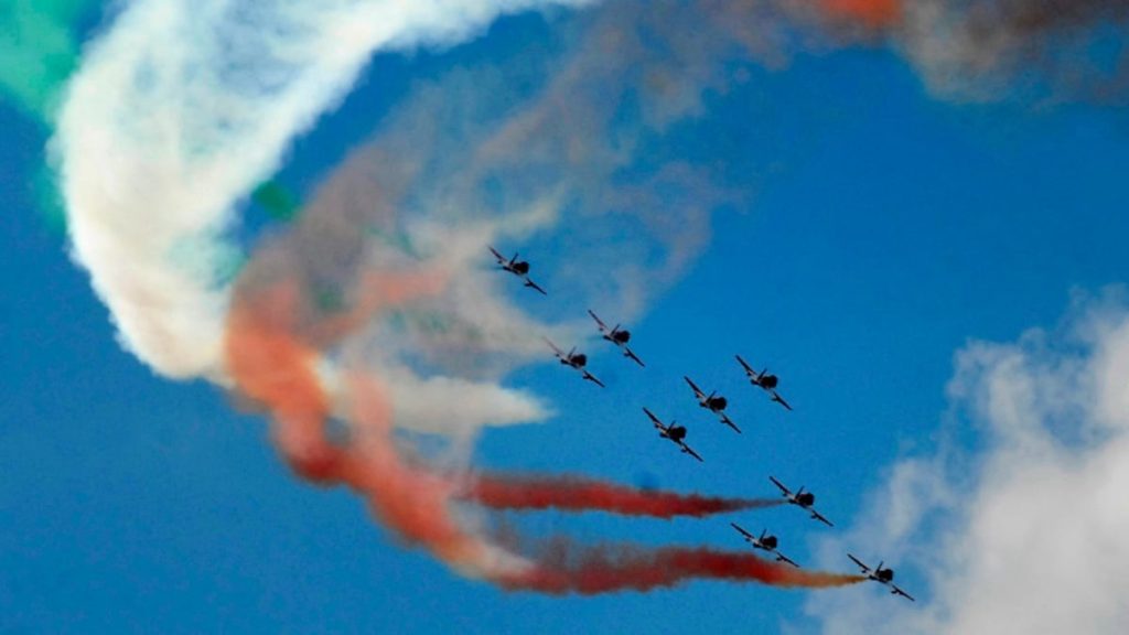 Suryakiran Hawk jets of the Indian Air Force with saffron and white smoke trails